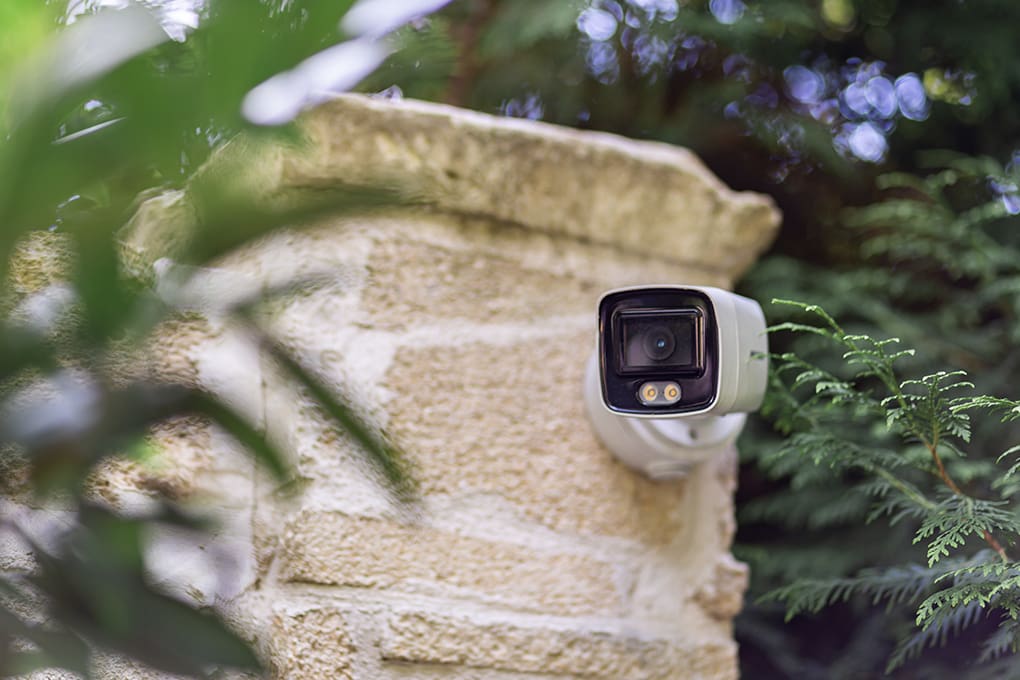 A wall mounted outdoor security camera installed.
